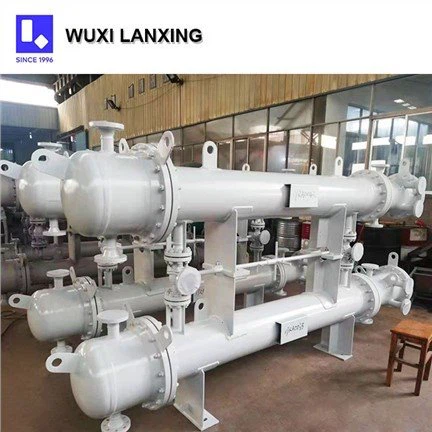 ما هي اعتبارات السلامة عند تشغيل مبادل حراري من نوع الأنبوب والغطاء؟